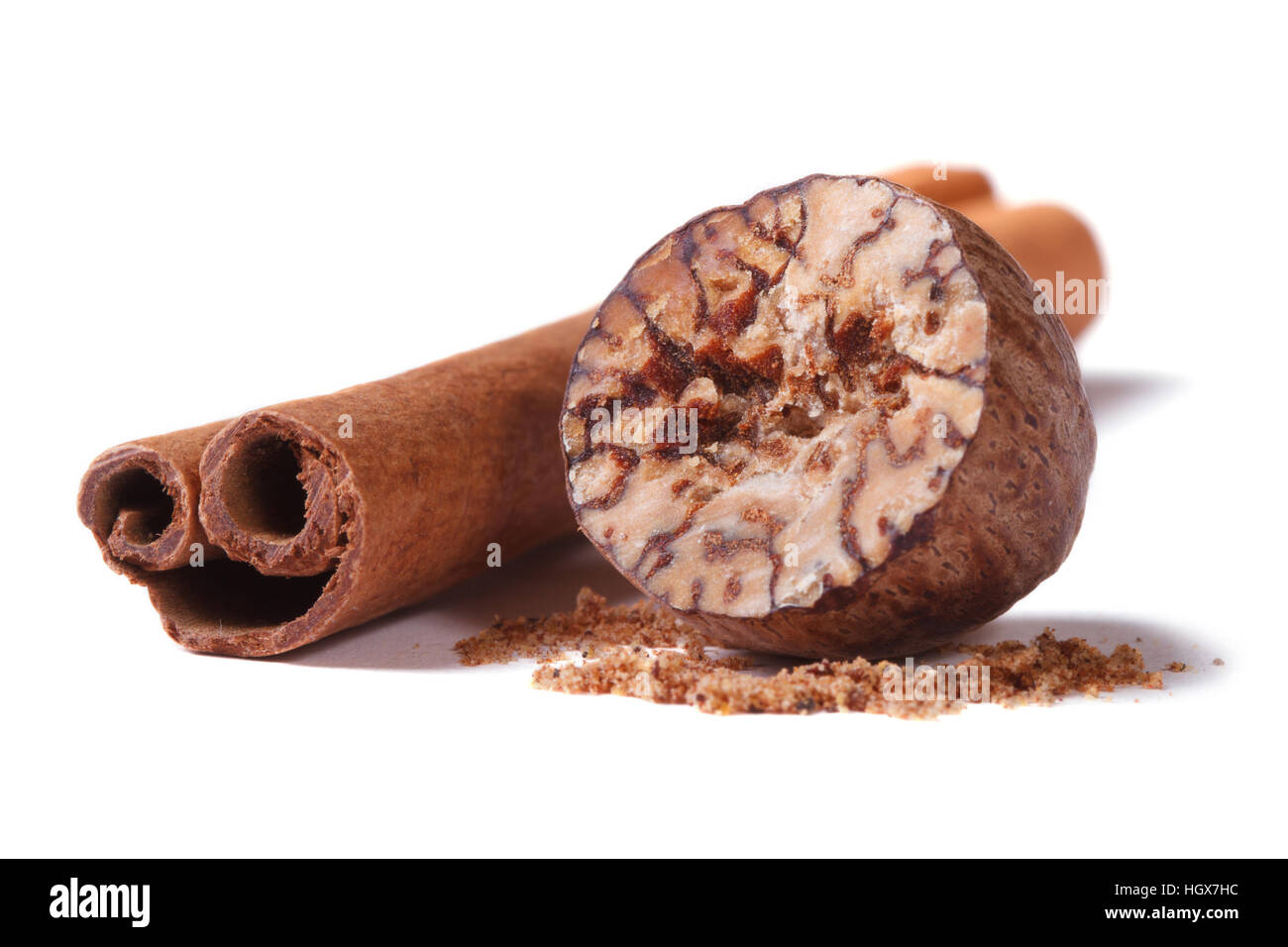Nutmeg and cinnamon stick isolated on white background Stock Photo Alamy
