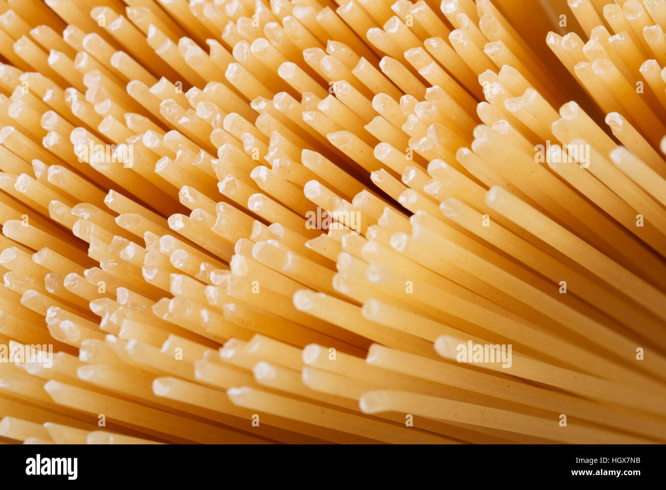 Hard Spaghetti dry spaghetti closeup texture. background. macro. top view Stock Photo ...