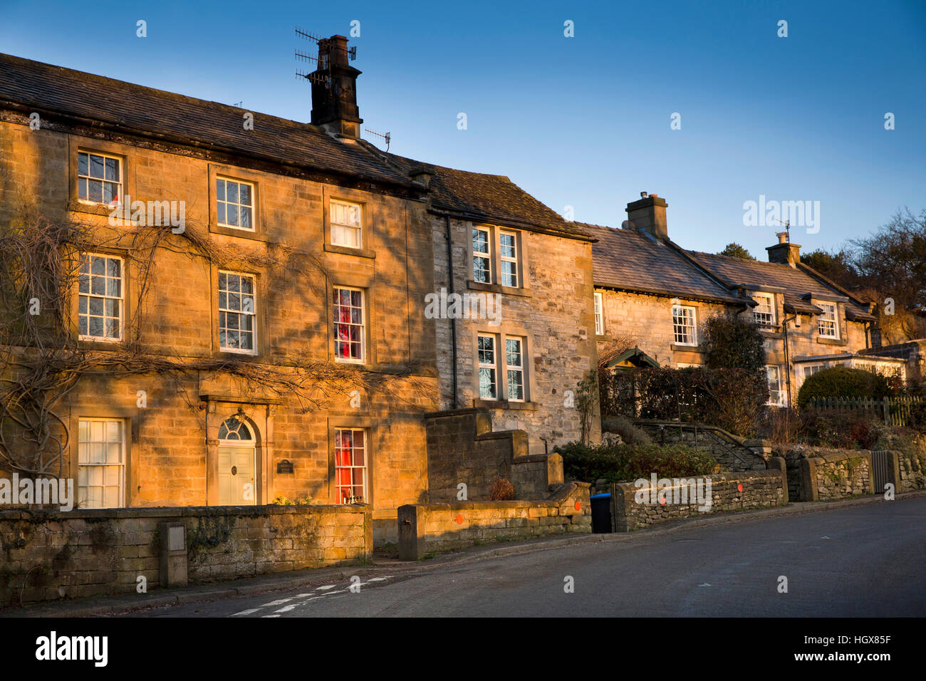 UK, England, Derbyshire, Ashford in the Water, Greaves Lane, winter, early morning sunlight on