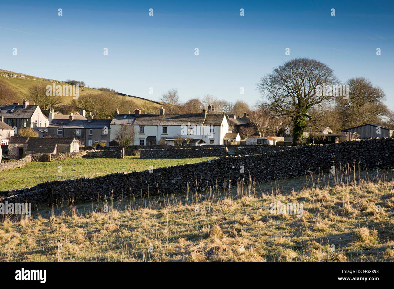 UK, England, Derbyshire, Litton, village houses across farmland Stock Photo