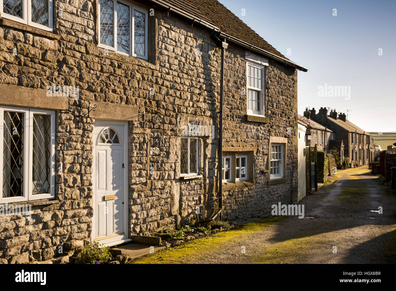 UK, England, Derbyshire, Litton, C18th stone cottage on Eastsides Lane leading to farmland Stock Photo