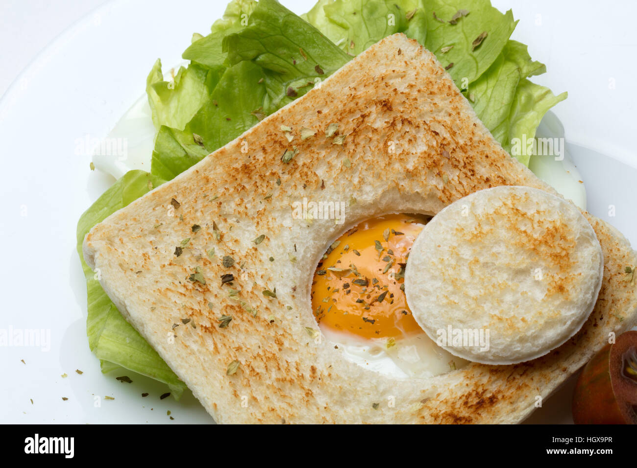 egg sandwich with lettuce and tomato in a beautiful food style Stock Photo