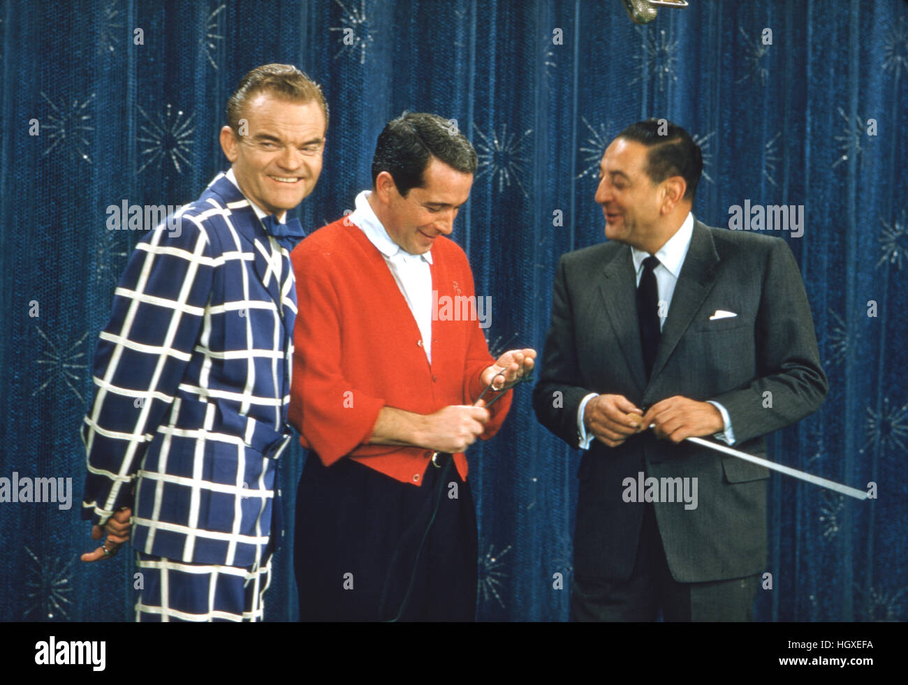 Spike Jones (left), Perry Como (center), and Guy Lombardo, appearing on stage at Como’s television show, 1956. Stock Photo