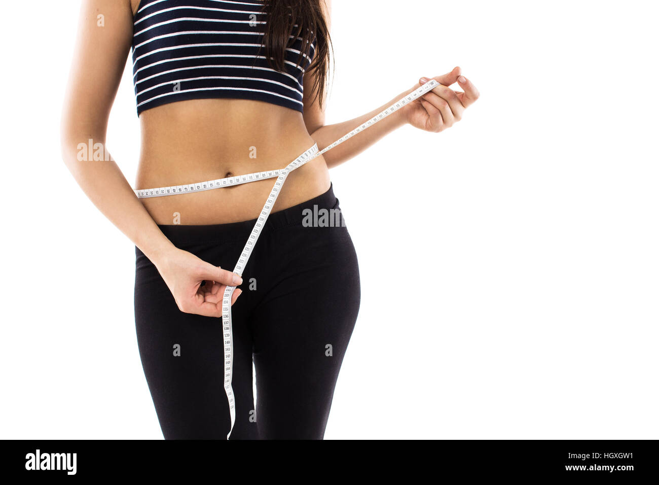 https://c8.alamy.com/comp/HGXGW1/slim-girl-measuring-her-waist-with-centimeter-measuring-tape-isolated-HGXGW1.jpg