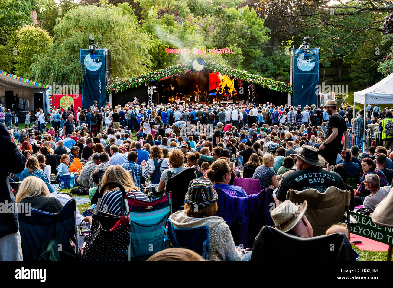 Festival crowd watching Oyster band at Moseley Folk Festival Birmingham UK. Stock Photo