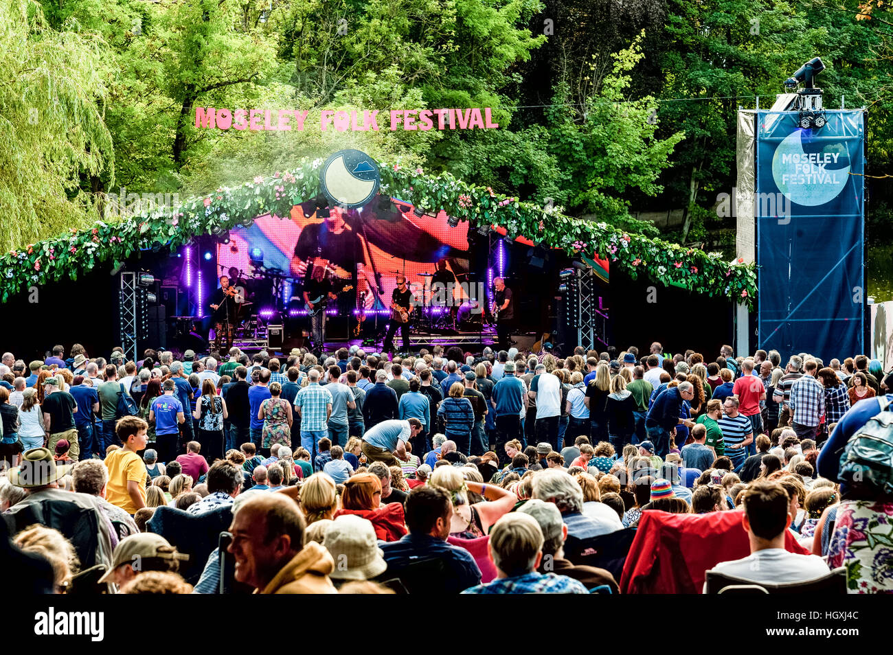 Festival crowd watching Oyster band at Moseley Folk Festival Birmingham UK. Stock Photo