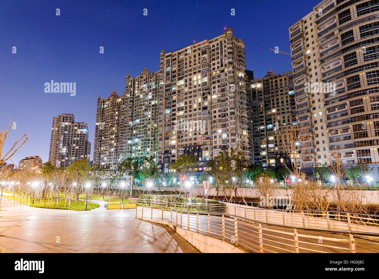 View of High rise apartment buildings at night in Shanghai Stock Photo - Alamy