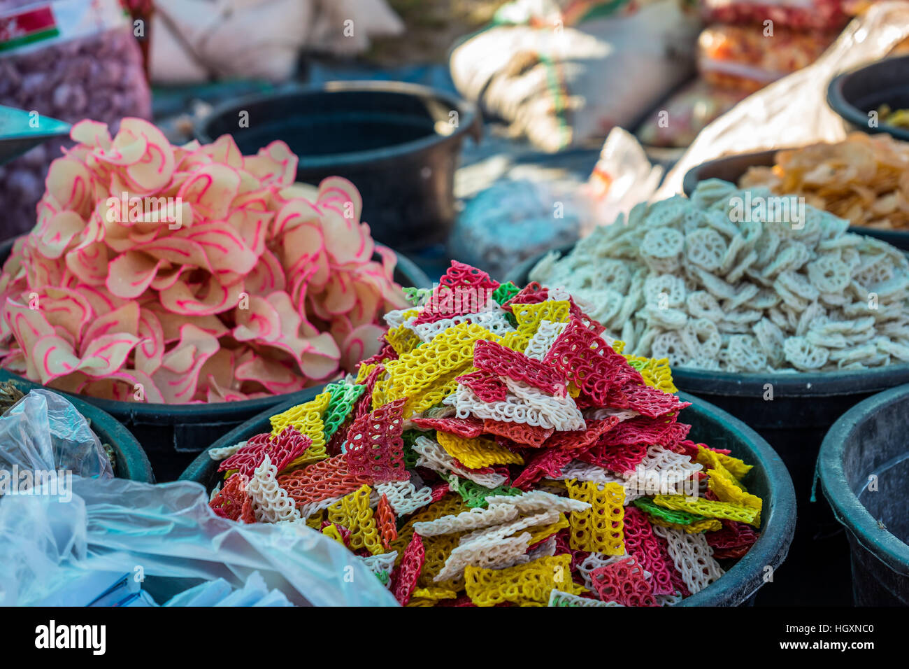 Raw Krupuk for sale at a traditional Indonesian market in Lombok, near Senaru. Krupuk krackers are made from fish or seafood and deep fried. Stock Photo