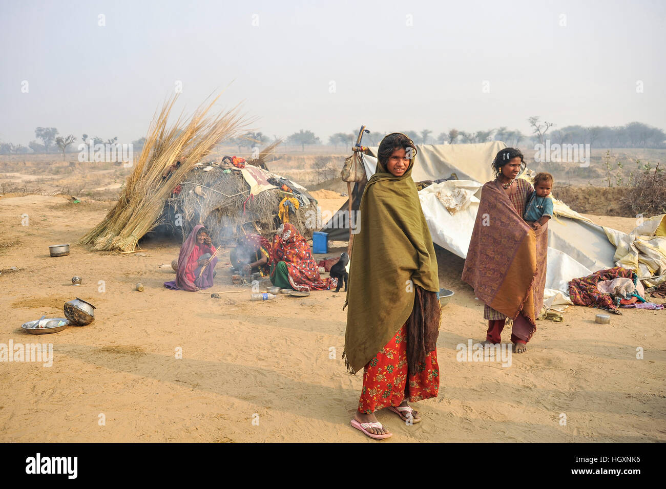 Nomadic Family & dwellings, Thar Desert, Rajasthan, India Stock Photo