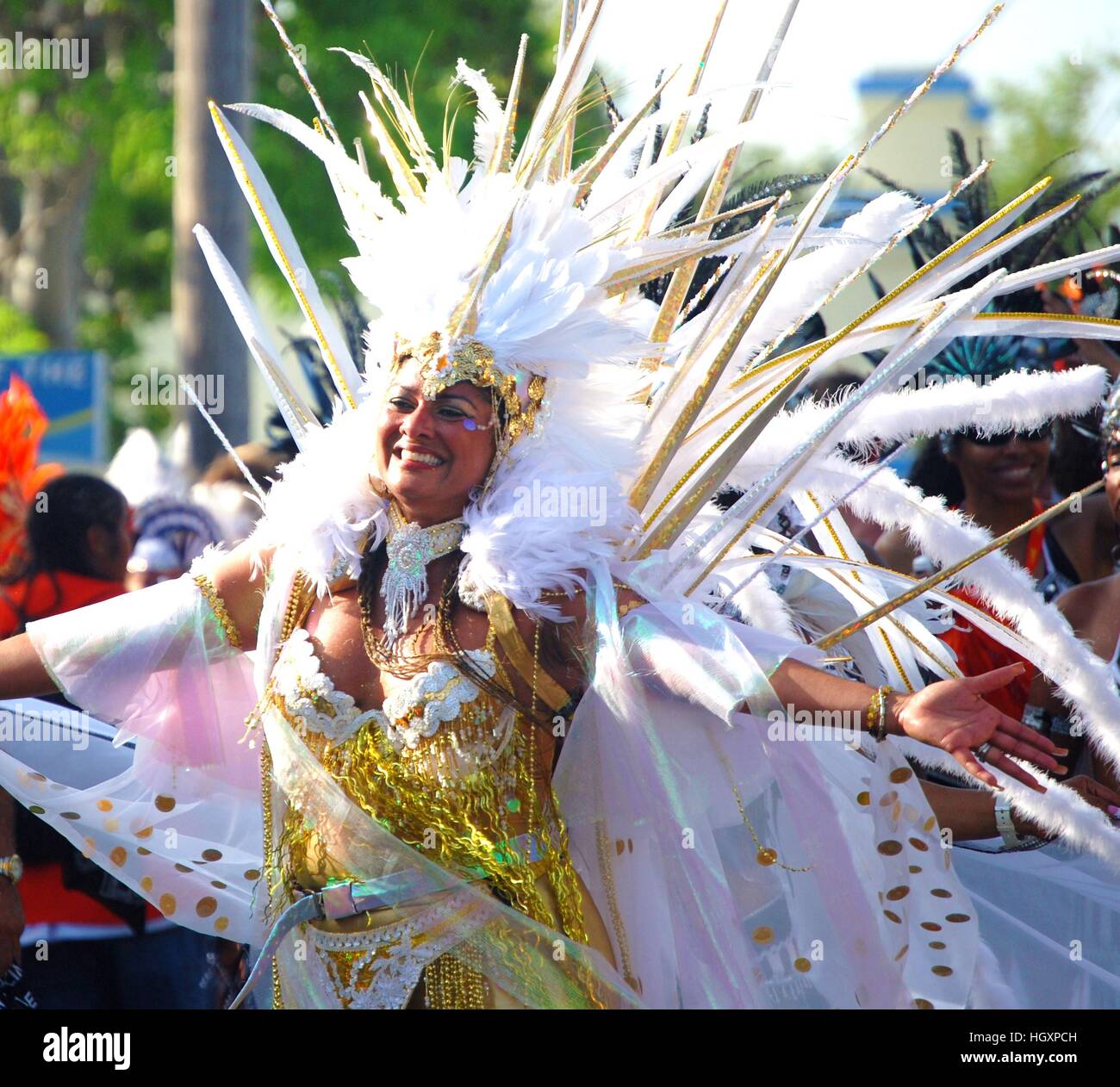 Carnival queen in white and gold costume Stock Photo - Alamy