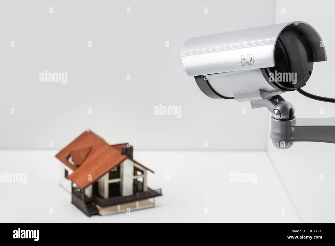 Surveillance camera watching a house Stock Photo Alamy