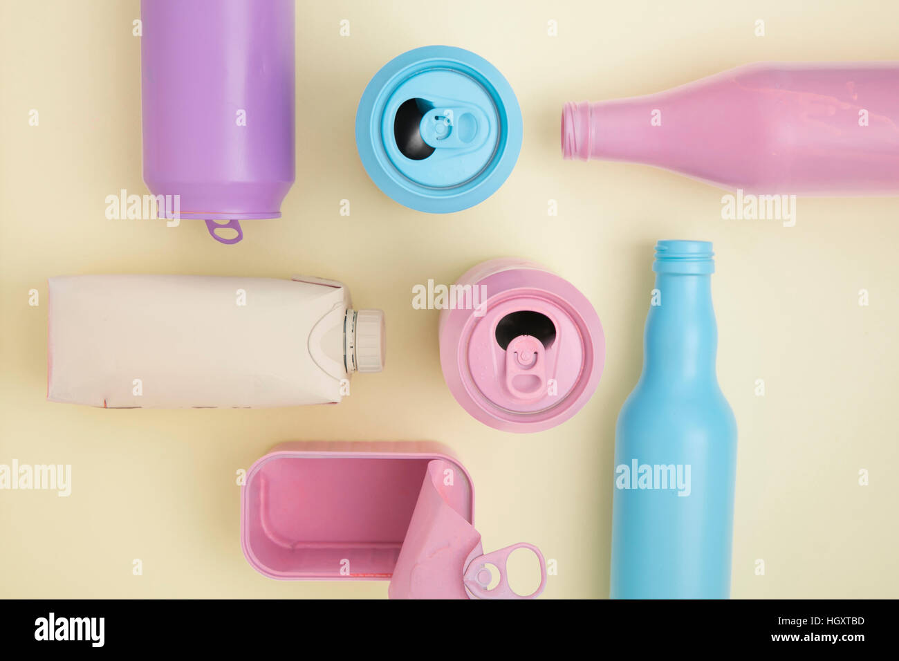 Various cans and bottles with pink, blue and purple Stock Photo