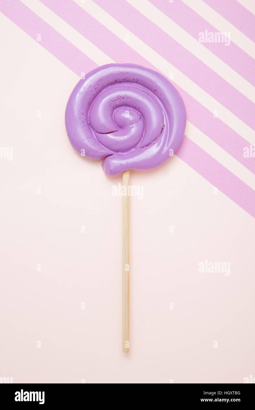 One purple lollipop Stock Photo - Alamy