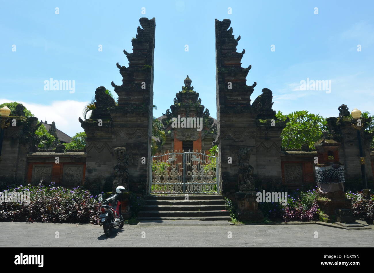 Scooter in front of split gate entrance to Bali Museum, art and history