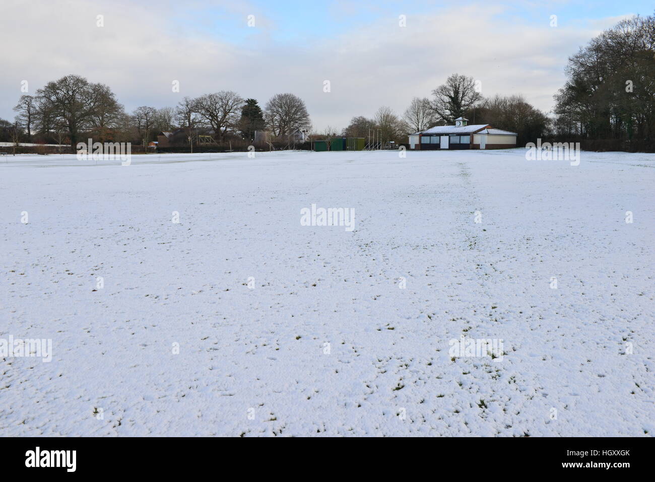 A cricket field covered in snow in winter Stock Photo Alamy