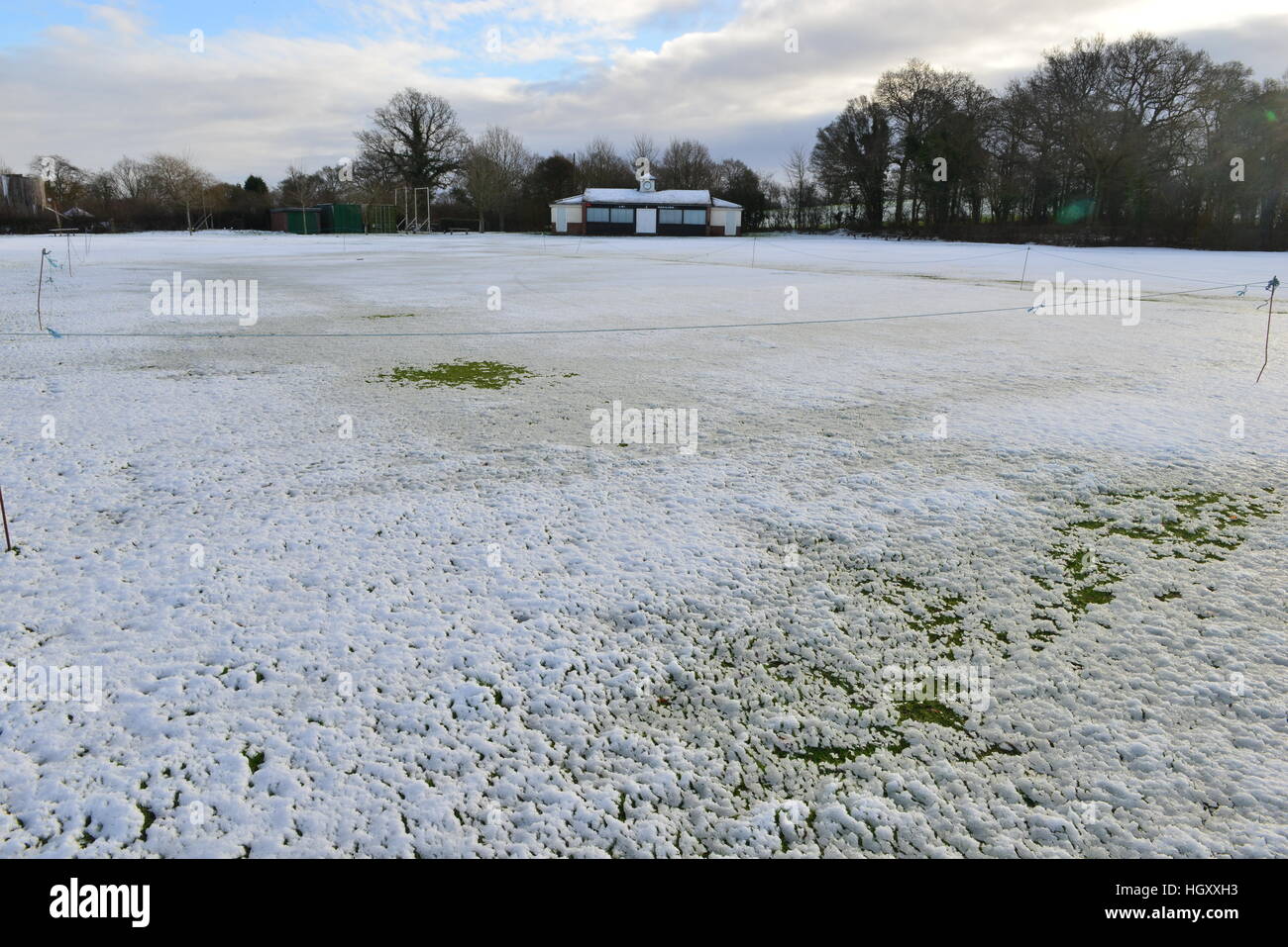 A cricket field covered in snow in winter Stock Photo Alamy