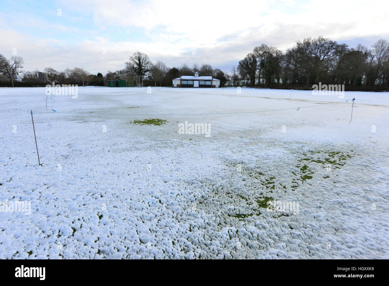 A cricket field covered in snow in winter Stock Photo Alamy