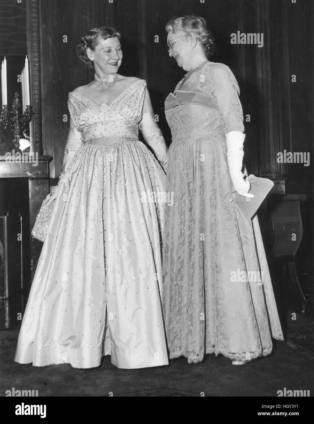 Mrs. Mamie Eisenhower and her mother Mrs. Elivera Doud (right) wearing their inaugural gowns. Stock Photo