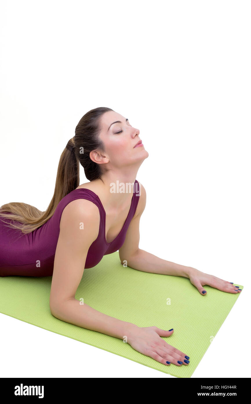 View at young woman practicing yoga in the studio Stock Photo