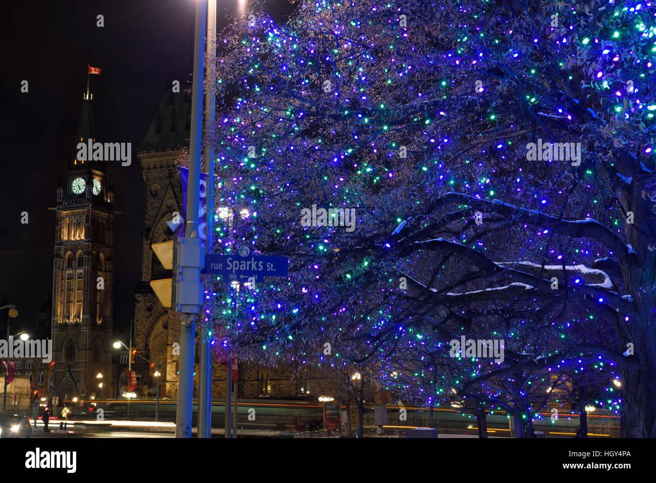 Blue Christmas lights at Confederation Square at Sparks street with Parliament Buildings Peace Tower Ottawa Stock Photo