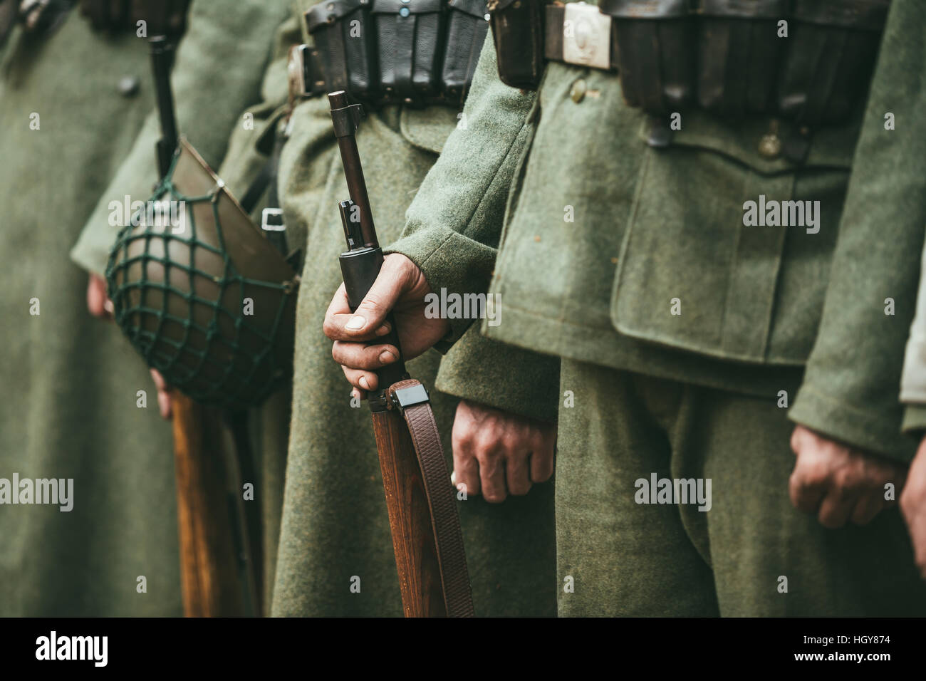 Close up of german military ammunition of a German soldier. Unidentified re-enactors dressed as World War II German soldiers standing order. Stock Photo