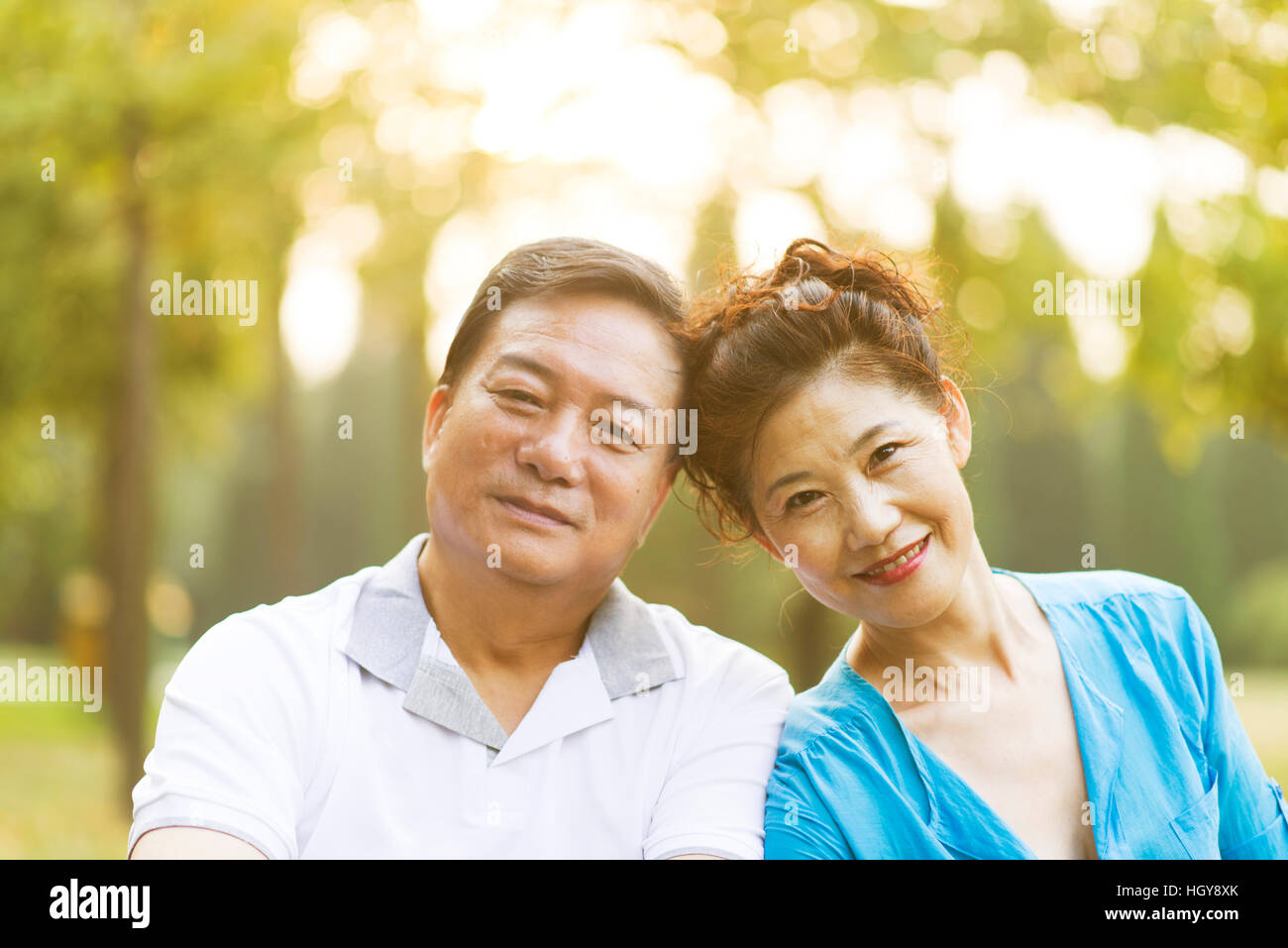 Love the elderly couple in the park early in the morning Stock Photo