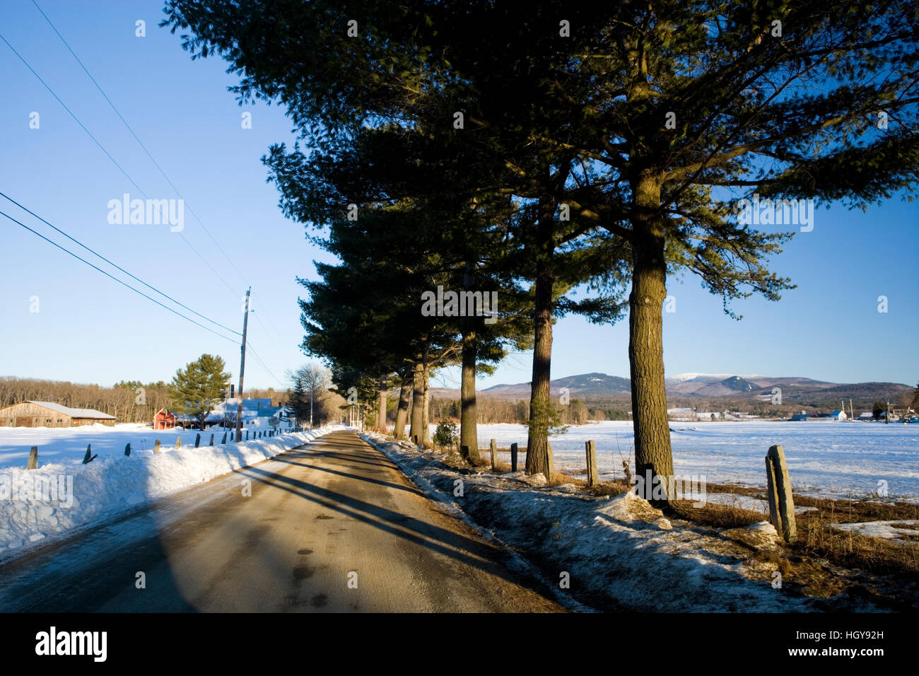 A road bisects a farm in North Haverhill, New Hampshire. Mount