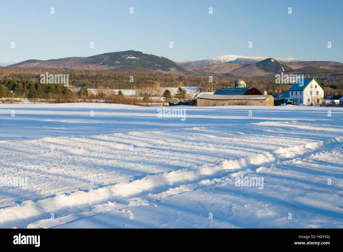 A farm in winter in North Haverhill, New Hampshire. Mount Moosilauke is