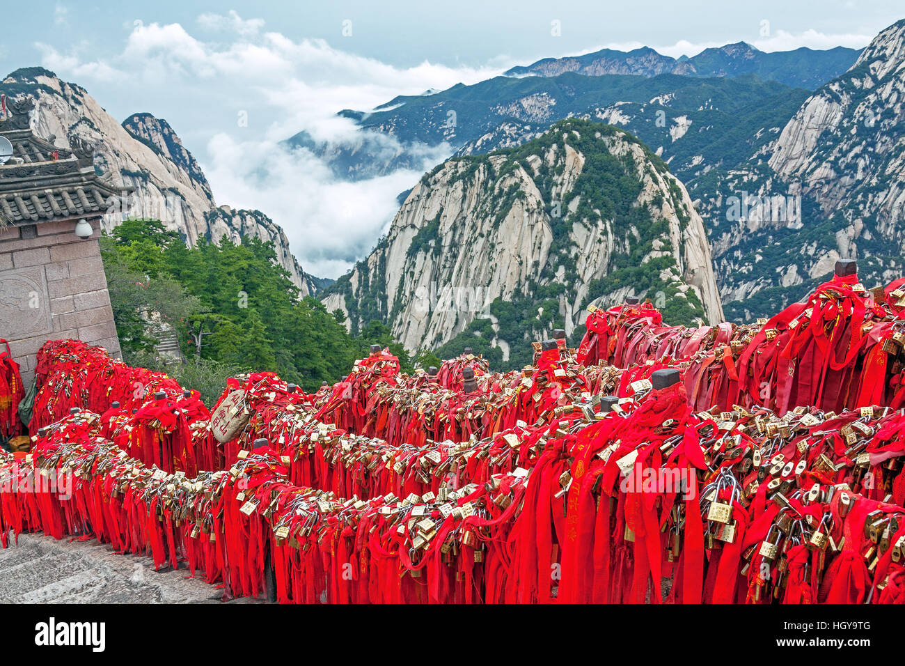 Majestic Huashan mountains with memorable red ribbons and traditional padlocks of lovers people in Huashan mountains, China Stock Photo