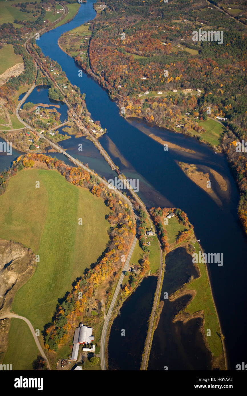 The Connecticut River flows between Norwich, Vermont and Hanover, New Hampshire. Aerial. Stock Photo