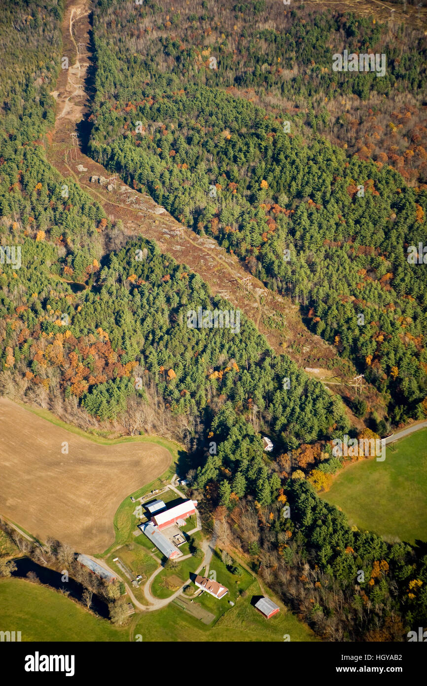 A farm and power lines in Monroe, New Hampshire.  Aerial. Stock Photo