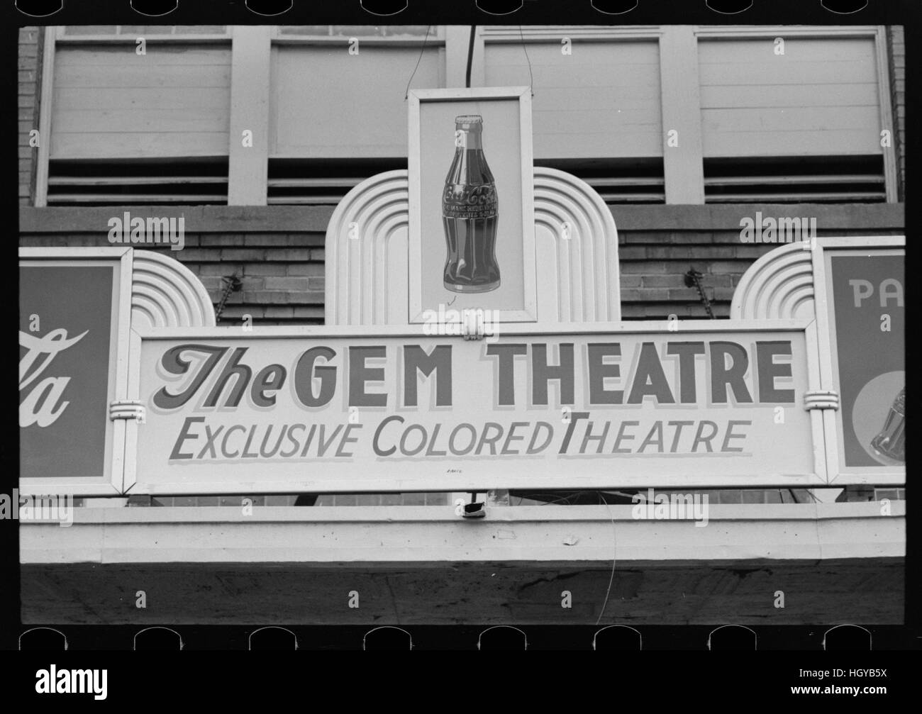 Sign above moving picture theater for African-Americans. Stock Photo