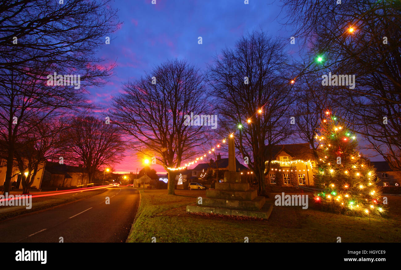 Christmas lights on the village green in Litton village, Peak District National Park, Derbyshire, England, UK Stock Photo