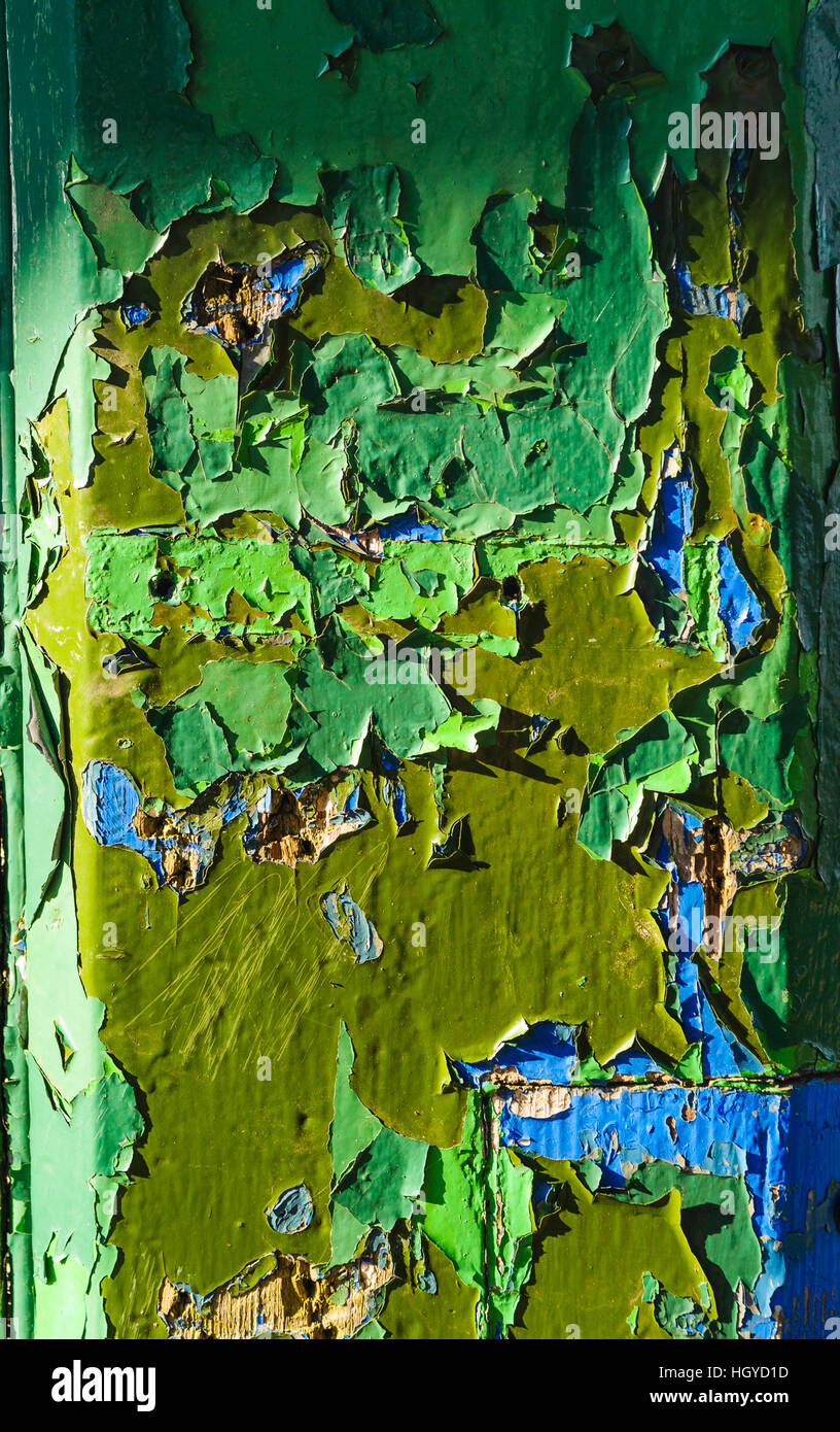 Peeling paint on weathered wooden post Stock Photo