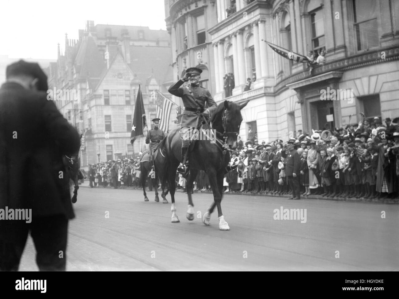 U.S. General John J. Pershing Saluting on Horseback while Leading World War I Veterans during Parade, New York City, New York, USA, Bain News Service, September 10, 1919 Stock Photo
