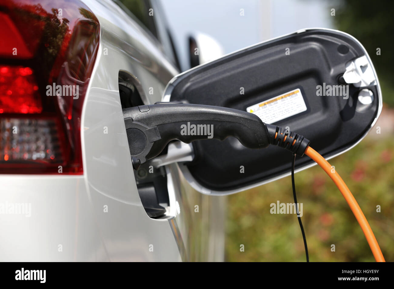 electric car being charged Stock Photo Alamy