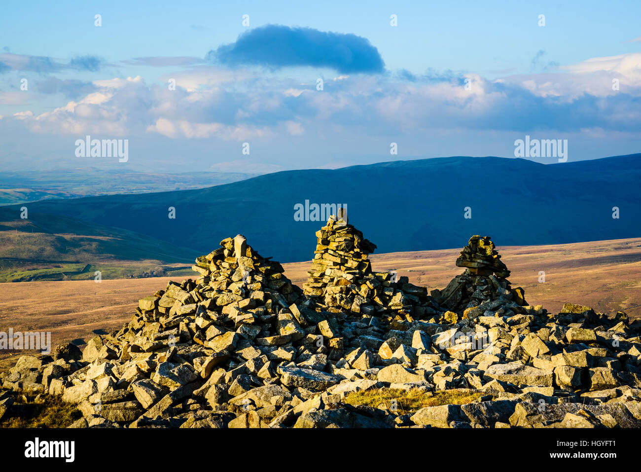 The enigmatic cairns known as the Three Men of Gragareth Lancashire close to the borders of North Yorkshire and Cumbria Stock Photo