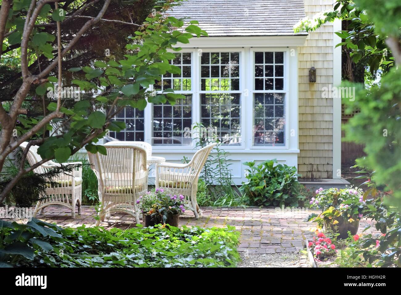 Outdoor green space of a New England Cape Cod style home on Martha's Vineyard, Massachusetts, USA Stock Photo