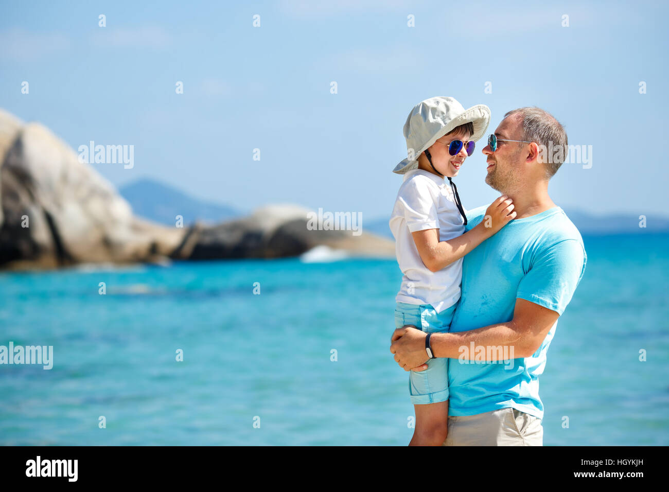 Happy father and his cute little son outdoors Stock Photo