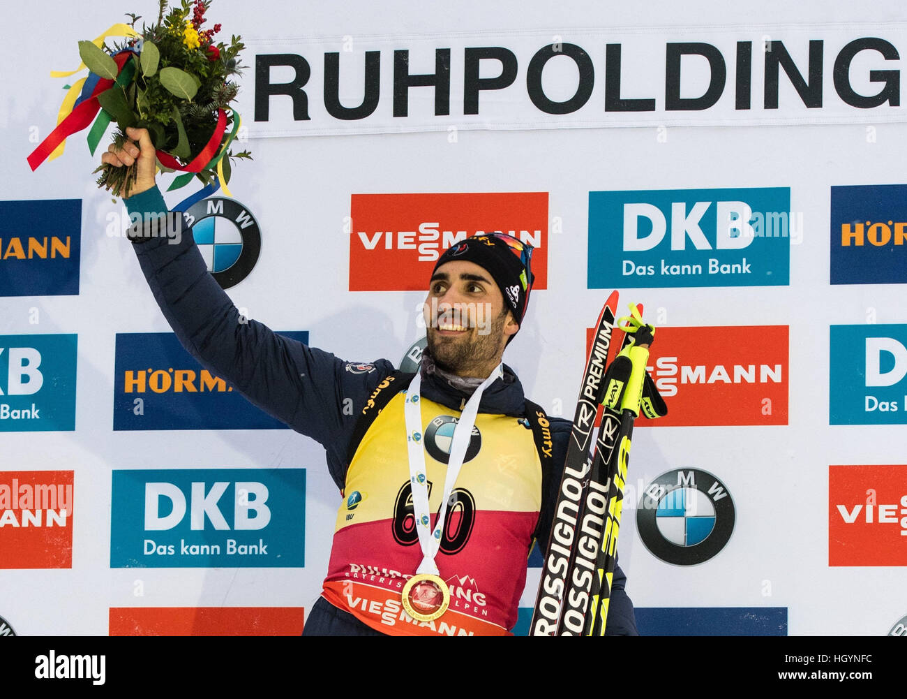 Ruhpolding, Germany. 13th Jan, 2017. French biathlete Martin Fourcade on the victors' podium after competing in the men's 10 kilometer sprint at the Biathlon World Cup in the Chiemgau Arena in Ruhpolding, Germany, 13 January 2017. Fourcade finished in 1st place, Eberhard in 2nd place and Svendsen in 3rd place. Photo: Matthias Balk/dpa/Alamy Live News Stock Photo