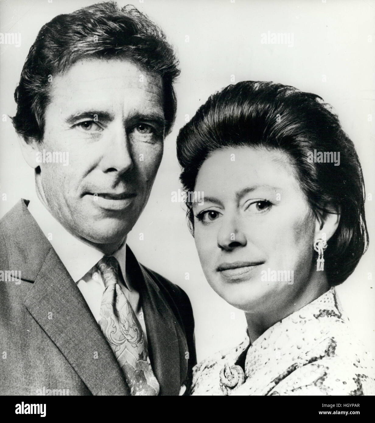 File. 13th Jan, 2017. ANTONY CHARLES ROBERT ARMSTRONG-JONES, 1st Earl of Snowdon (March 7, 1930 - January 13, 2017), commonly known as Lord Snowdon, was an English photographer and film maker. He was married to Princess Margaret, younger daughter of King George VI and younger sister of Queen Elizabeth II. Lord Snowdon died peacefully at his home. Pictured: May 05, 1974 - H.R.H. Princess Margaret and Lord Snowdown.: An informal portrait of Princess Margaret and Lord Snowdon, taken at Kensington Palace. The Princess is wearing a snake-skin prnt caftan' matching brooch and earrings. Princess Stock Photo