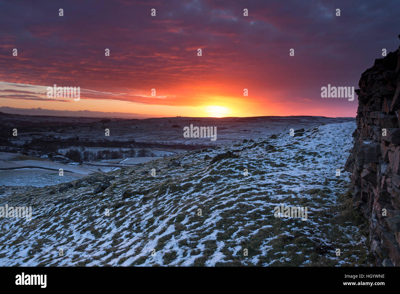 Kirkcarrion, Teesdale, County Durham UK. Saturday 14th January 2017. UK Weather.  It was a frosty and snowy start to the day as the sun rose over the North Pennine valley of Lunedale in the North East of England.  The forecast is for a dry day, although cloud will thicken later this evening to bring outbreaks of rain overnight.  © David Forster/Alamy Live News Stock Photo