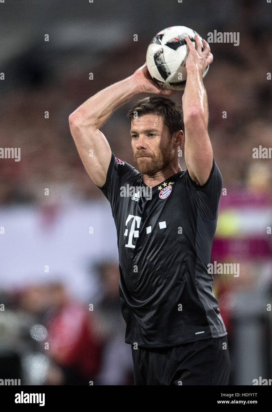 Duesseldorf, Germany. 14th Jan, 2017. Bayern's Xabi Alonso in action during the Telekom Cup soccer match between Fortuna Duesseldorf and Bayern Munich in the ESPRIT arena in Duesseldorf, Germany, 14 January 2017. Photo: Federico Gambarini/dpa/Alamy Live News Stock Photo