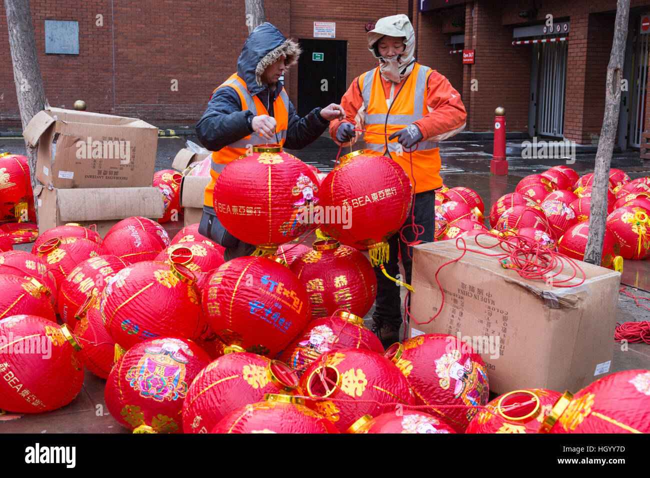 London, UK. 14 January 2017. Red lantern decorations go up in Stock