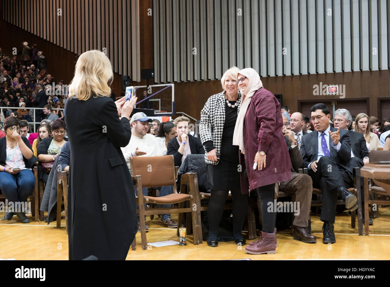 London, Ontario, Canada, 13th January, 2017. Kate Young, Member of Parliament (MP) London West, takes a picture of members of the audience before the start of a town hall Q&A with the Prime Minister of Canada, held in London, Ontario. London was one of the Prime Minister's stops as part of his cross-country tour. Credit: Rubens Alarcon/Alamy Live News Stock Photo