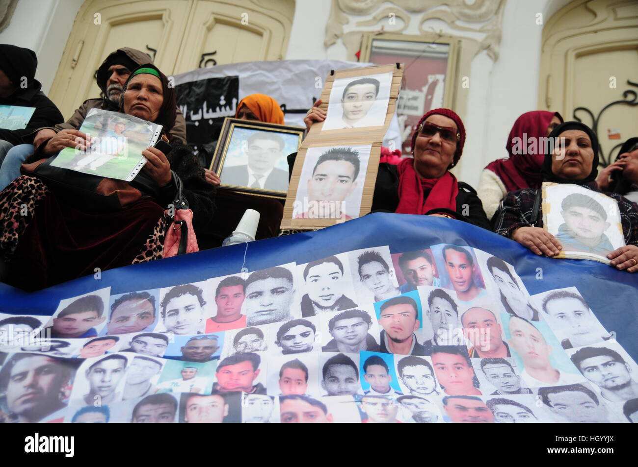 Tunisia. 14th Jan, 2017. Mothers of missing people demonstrate with pictures of their loved ones during the celebrations regarding the sixth anniversary of the peaceful revolution in Tunis, Tunisia, 14 January 2017. Many deaths from six years back are still unsolved, as well aus protestors who had gone missing. Tunisia is considered the 'motherland' of the arab spring, and has been the sole country to succeed in the transition towards a parliamentary democracy. Photo: Simon Kremer/dpa Credit: dpa picture alliance/Alamy Live News Stock Photo