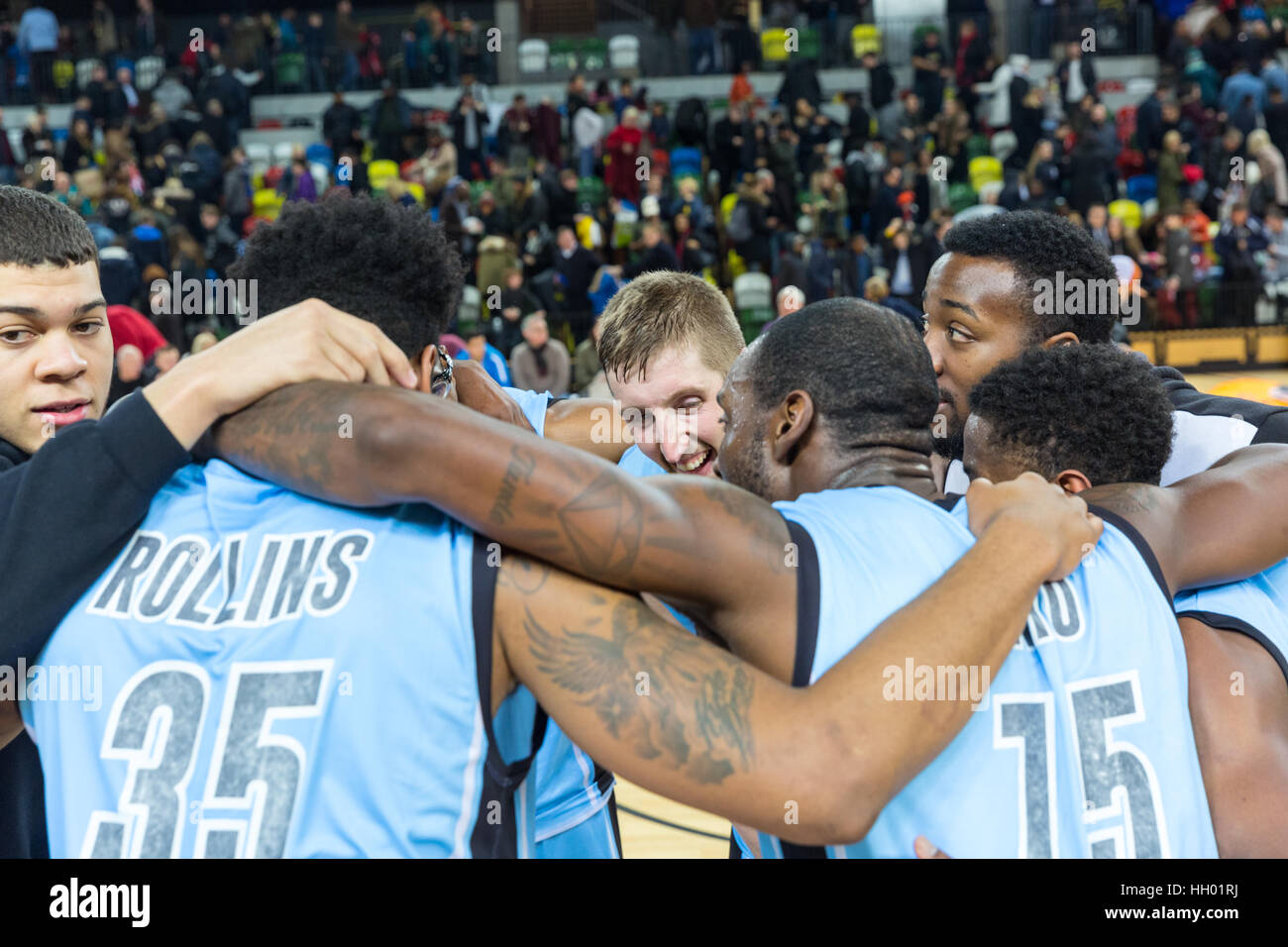 London, UK. 14th January, 2017. Surrey players celebrate their win. Tensions run high in the BBL Trophy basketball game between home team London Lions and visitors Surrey Scorchers as both teams try to get to the next round of the Trophy. Scorchers pinch the game in the last 20 seconds and win 88-87 over the Lions. Credit: Imageplotter News and Sports/Alamy Live News Stock Photo
