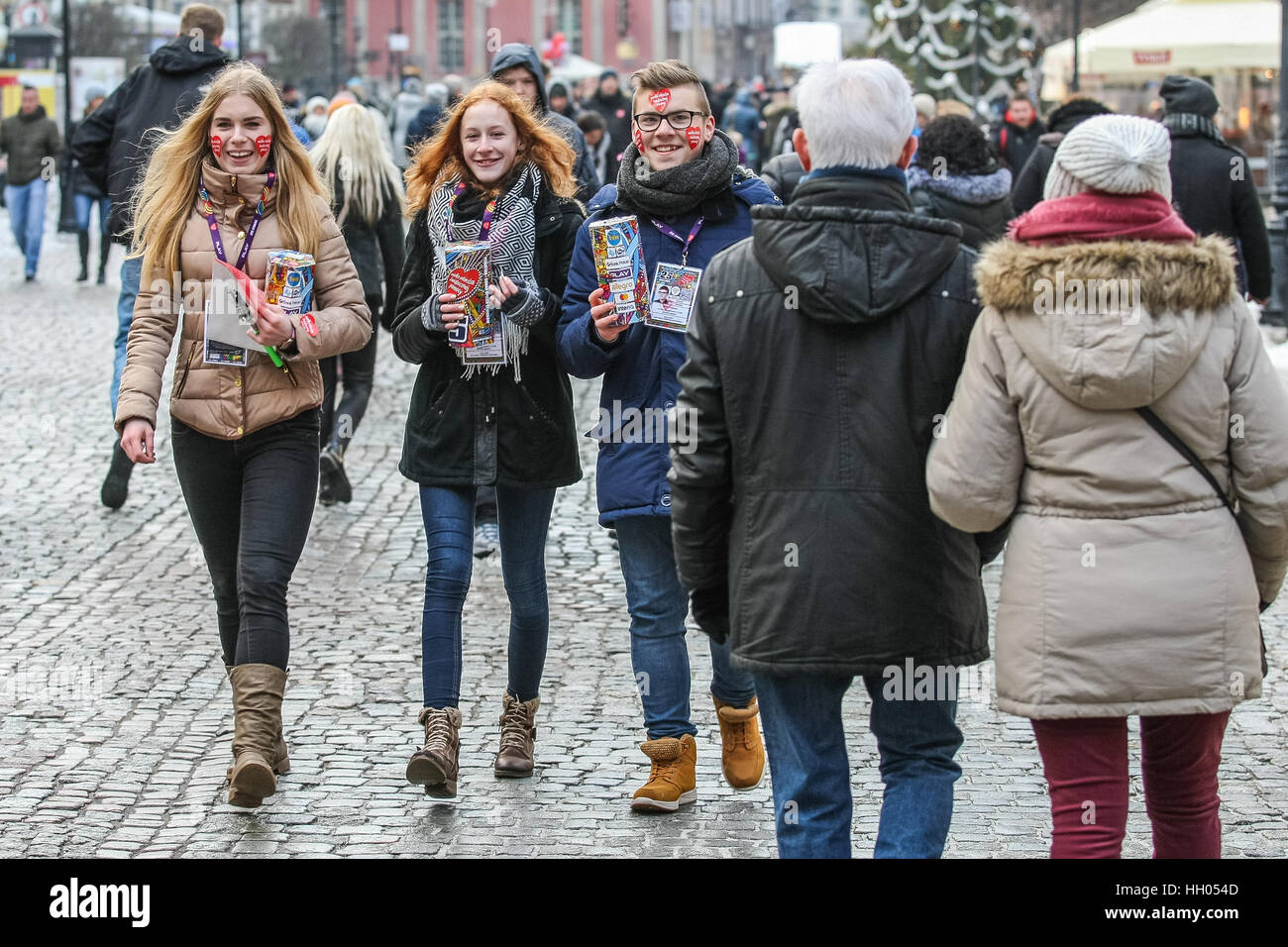 Gdansk, Poland. 15th January 2017. Volunteers collecting money are seen during 25th Grand Finale of Great Orchestra of Christmas Charity (WOSP) on January 15th, 2017 in Gdansk. Over 120 thousands of volunteers across the Poland collect money on the streets in special cans labelled with a red heart. This year finale is once again devoted to paediatrics and geriatrics. Credit: Michal Fludra/Alamy Live News Stock Photo