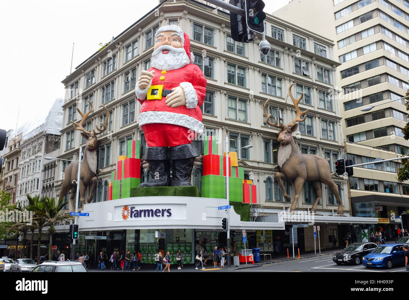 A giant Father Christmas on the front of a Farmers store in Auckland