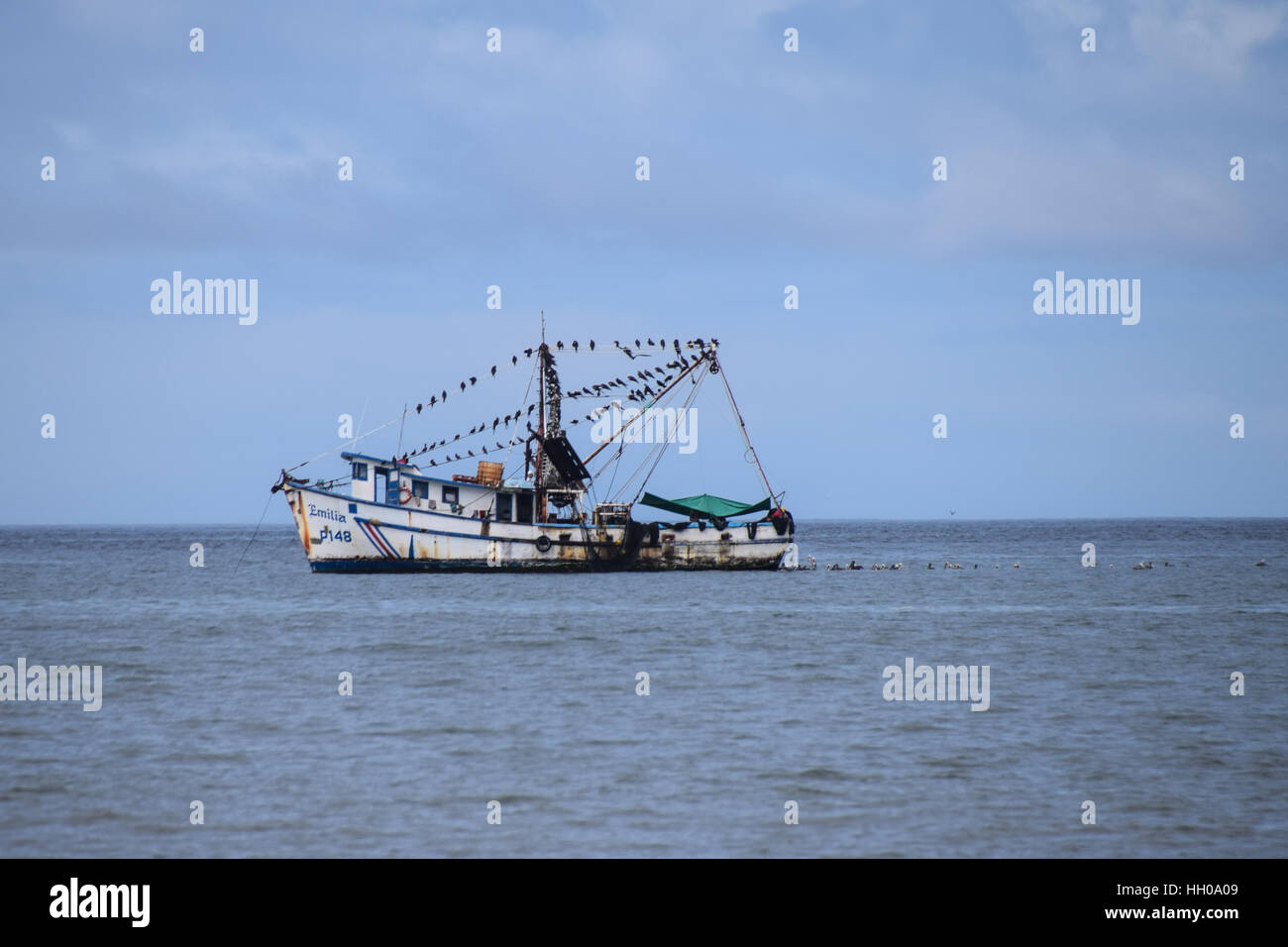 Fishing trawler moored off Playas del Coco, Guanacaste, Costa Rica Stock Photo